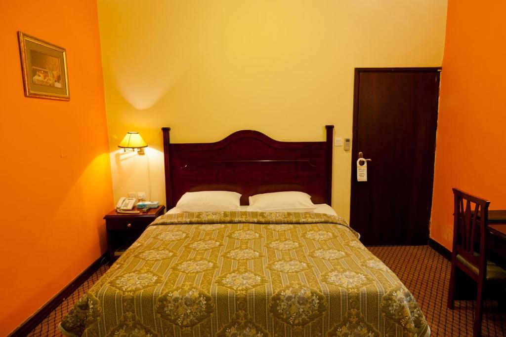 Doha Grand Hotel Chambre photo